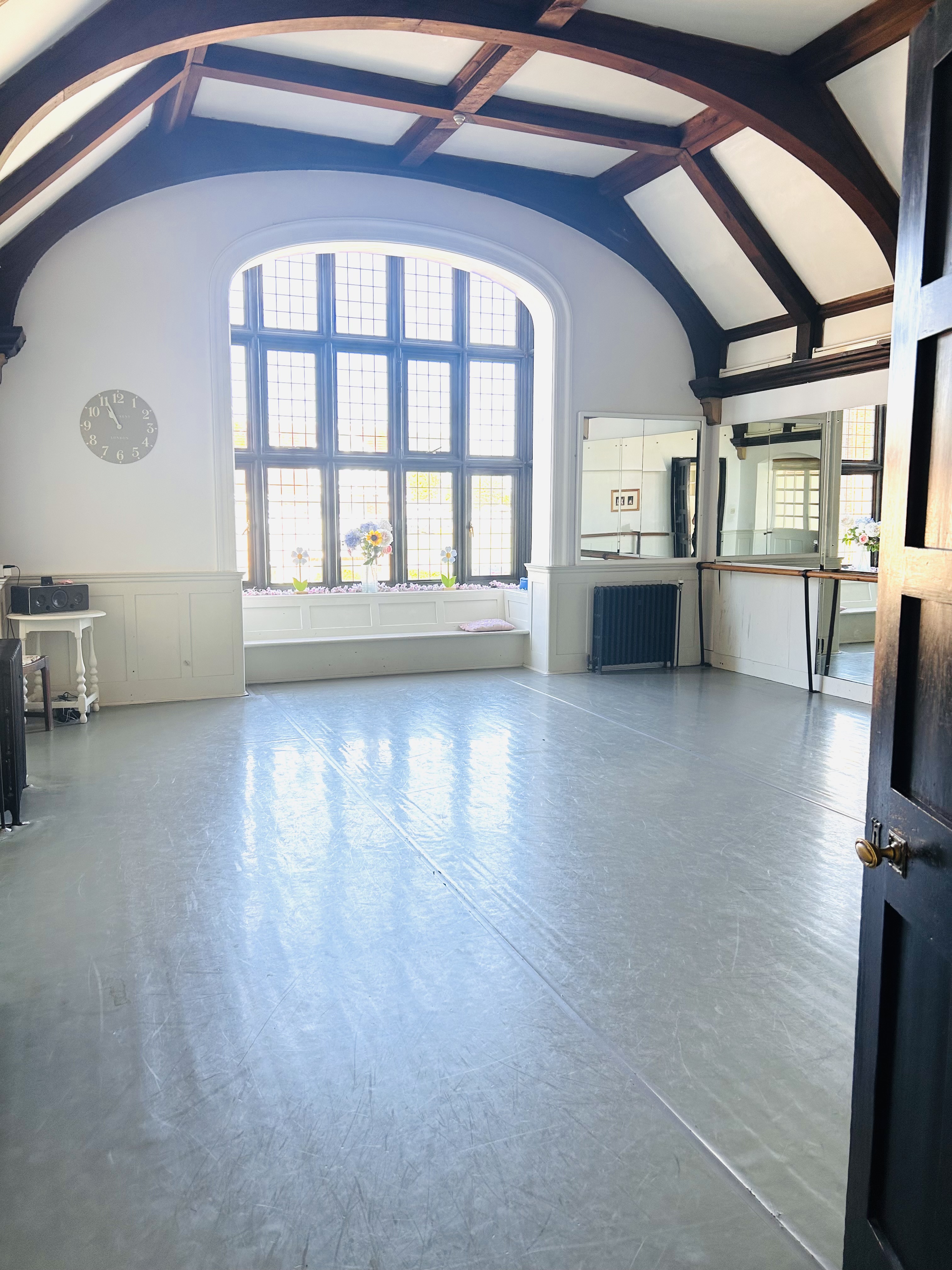 Lovely Dance Studio with Mirrors and Ballet Barres