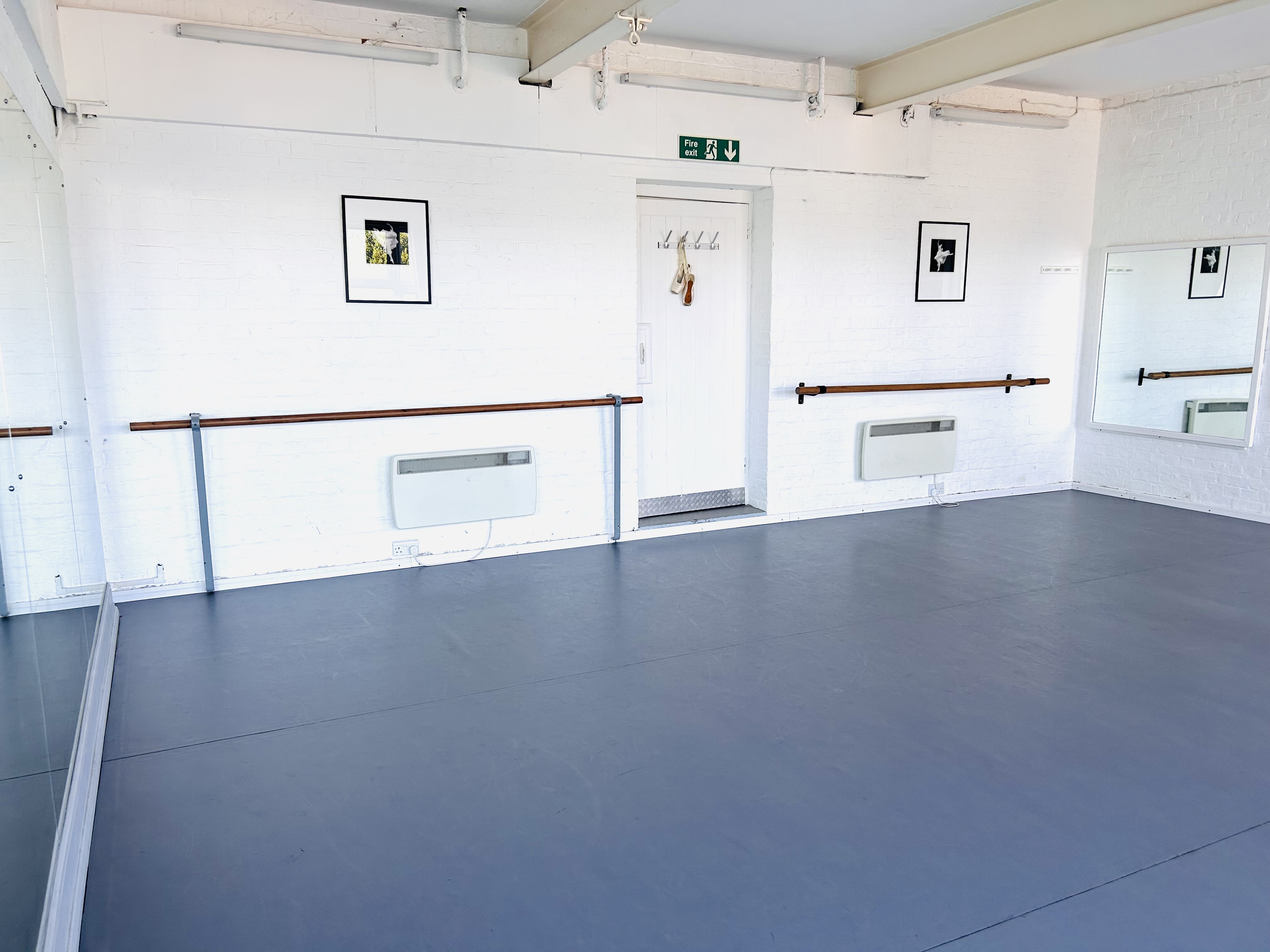 Lovely Dance Studio with Mirrors and Ballet Barres